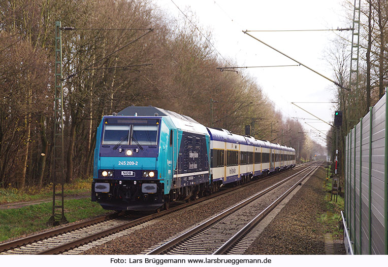 Baureihe 245 mit einem Eilzug nach Westerland in Prisdorf